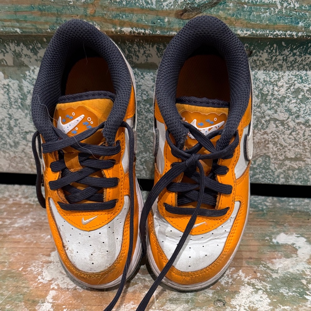 Nike Kids Black, Orange, and White Sneakers